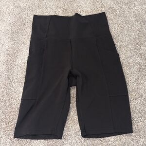 REI black 8 inch Take Your time yoga shorts
